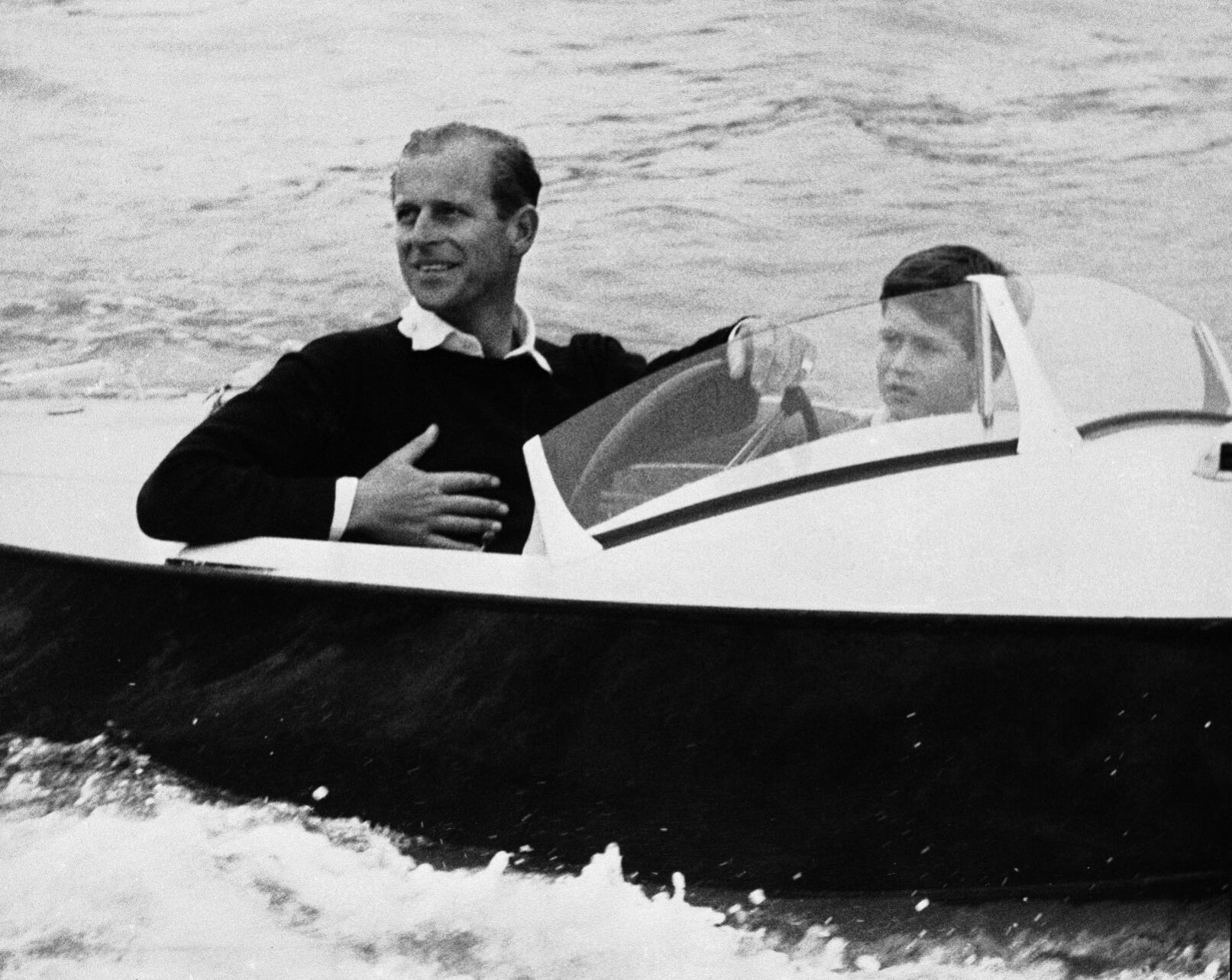 1957: Prince Philip with Prince Charles